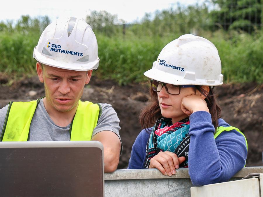 GEO-Instruments specialists reviewing monitoring data